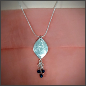 Ensemble pendentif et boucles d'oreilles en argent .960 No1