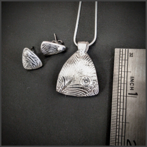 Ensemble pendentif et boucles d'oreilles en argent .960 No 2