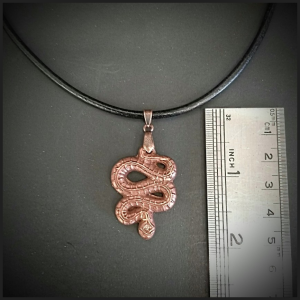 Copper snake pendant